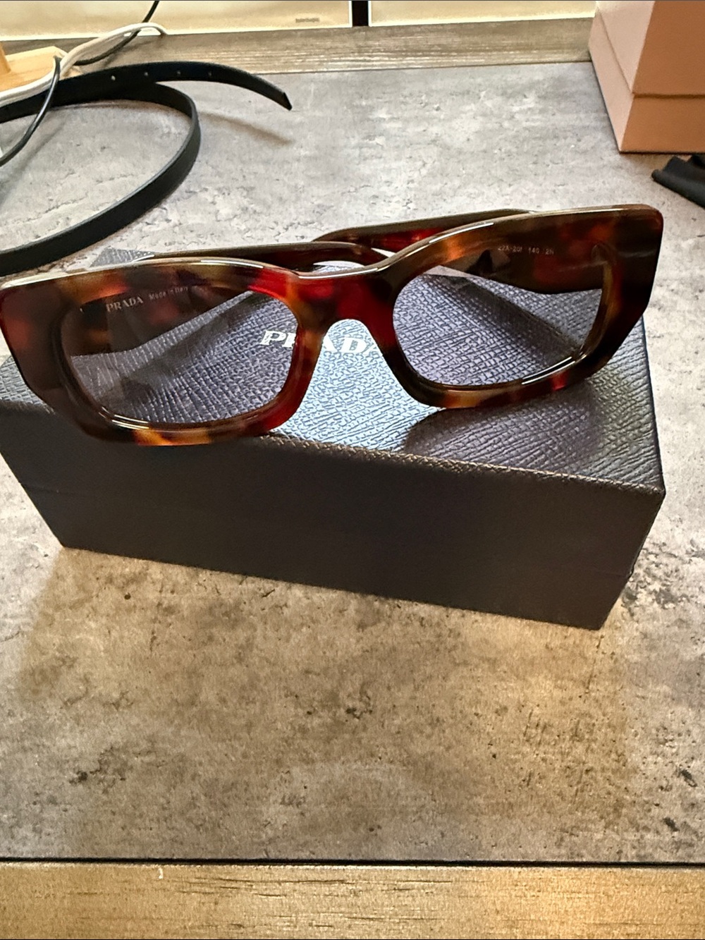 Prada Tortoiseshell Acetate Rectangular Glasses in Brown and Amber